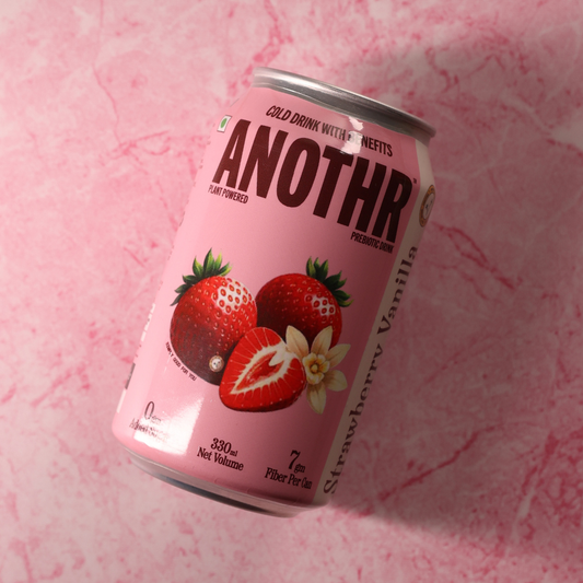Pink can of 'Anothr' strawberry vanilla flavor on a pink textured background. Drink another 
